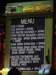 A diner menu listing various options, every one including some form of spam.